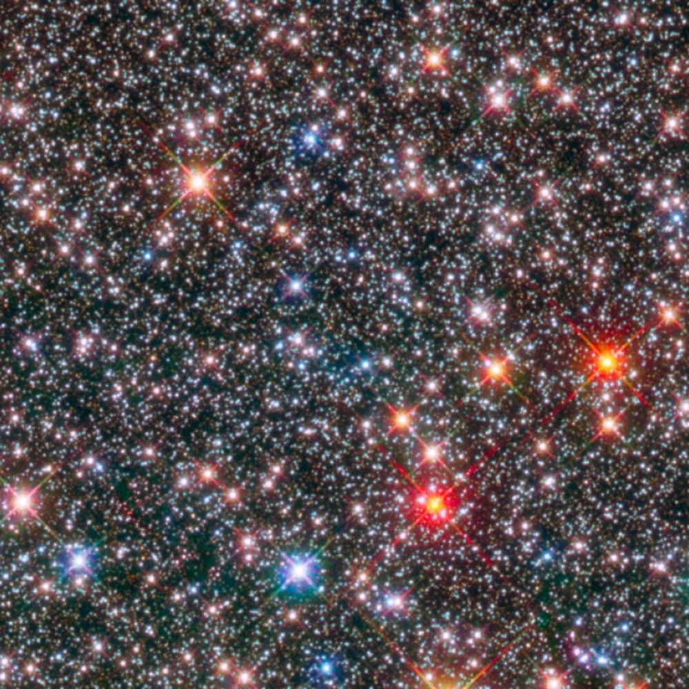 Hubble Space Telescope deep field image showing dense clusters of galaxies and stars illustrating the large-scale structure of the universe.