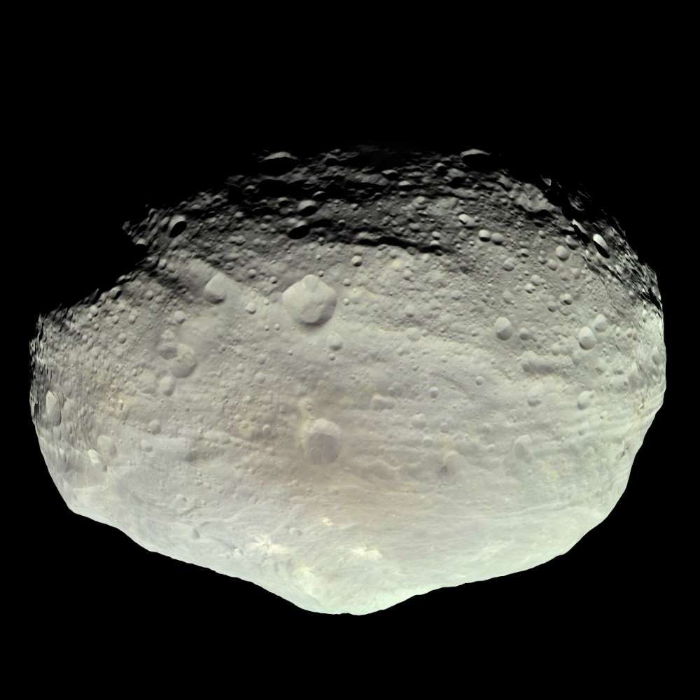 High-resolution image of asteroid 4 Vesta showing its irregular shape, heavily cratered surface, and rocky terrain, one of the largest bodies in the asteroid belt.