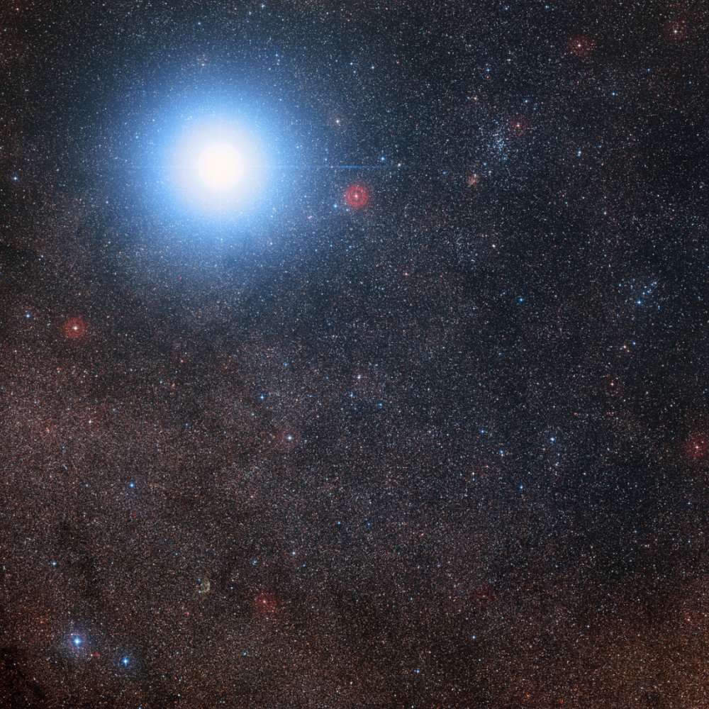High-resolution wide-field image of Alpha Centauri A, the brightest star in the Alpha Centauri system, shining prominently against a dense background of Milky Way stars.