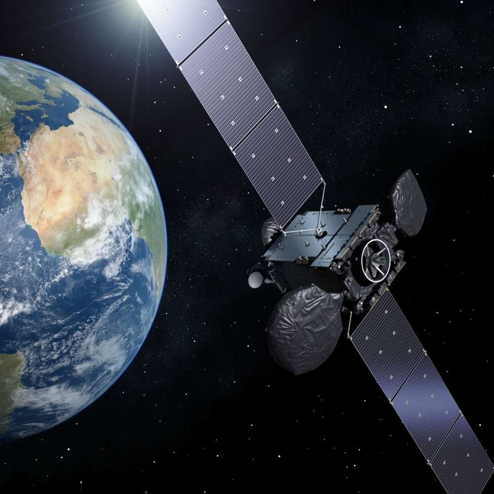Geostationary satellite orbiting Earth above the equator, maintaining a fixed position relative to the planet for continuous communication and weather monitoring.