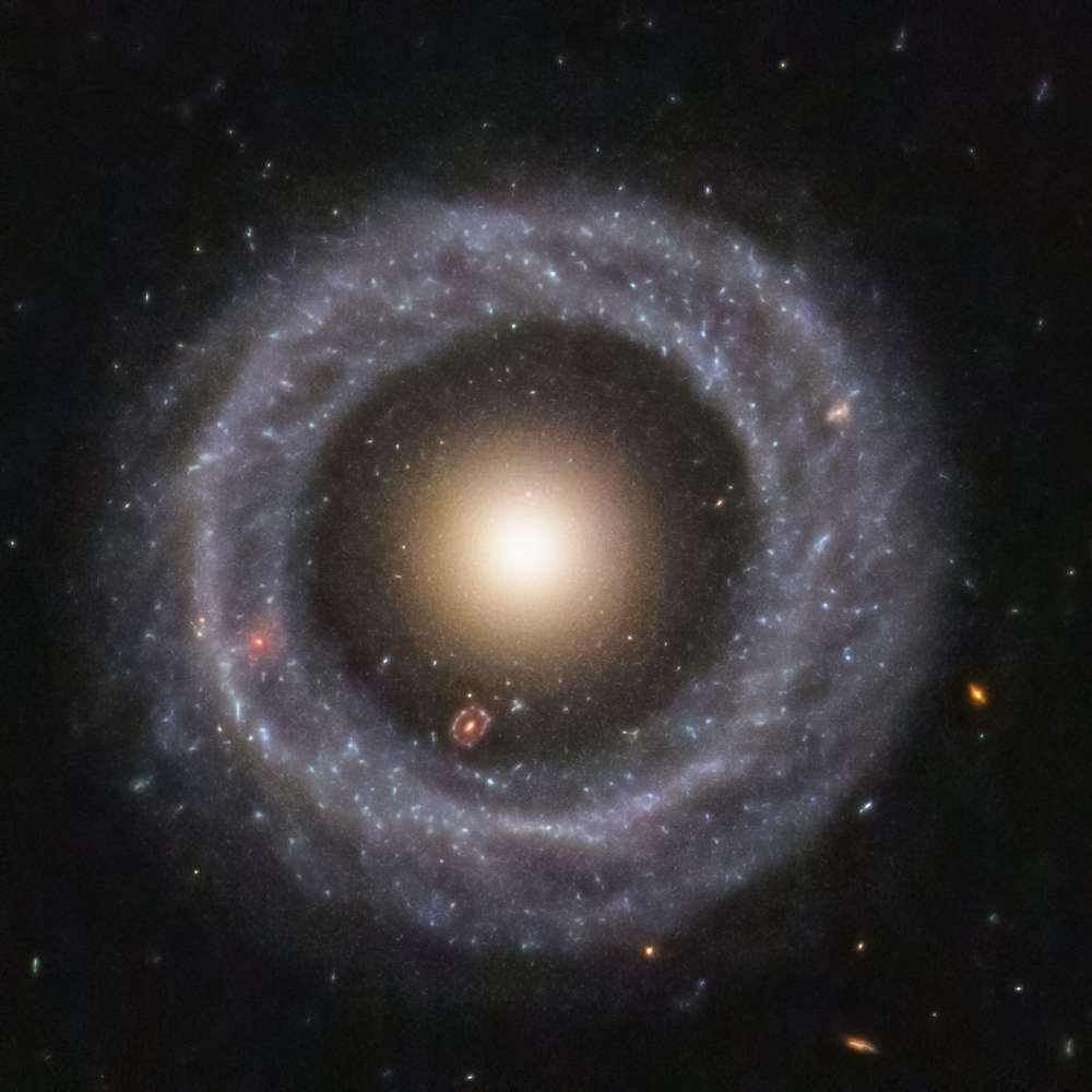 High-resolution Hubble image of Hoag’s Object, a rare ring galaxy featuring a bright spherical core surrounded by a nearly perfect outer star-forming ring.