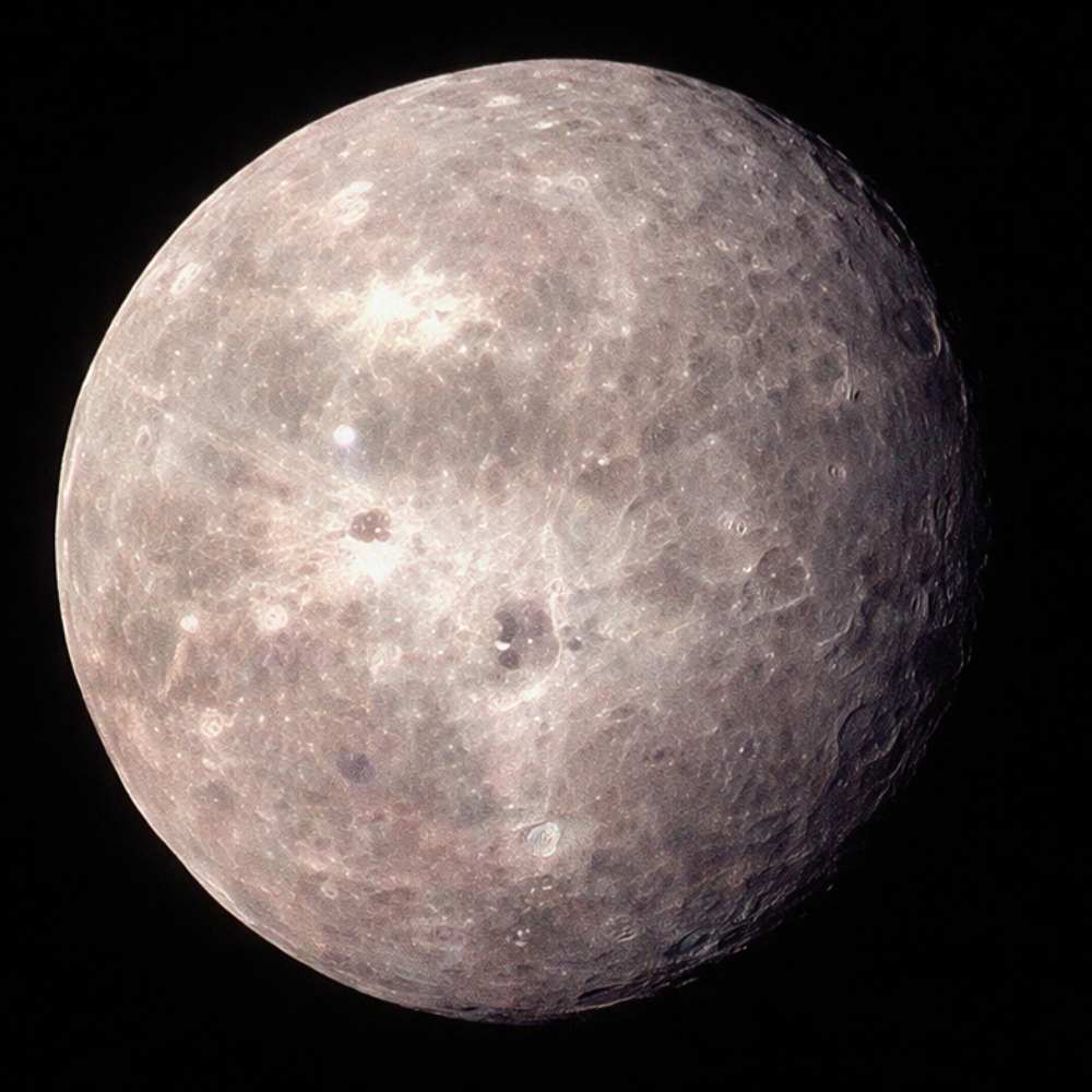 Oberon, the second-largest moon of Uranus, showing its icy surface, ancient impact craters, and darkened terrain.