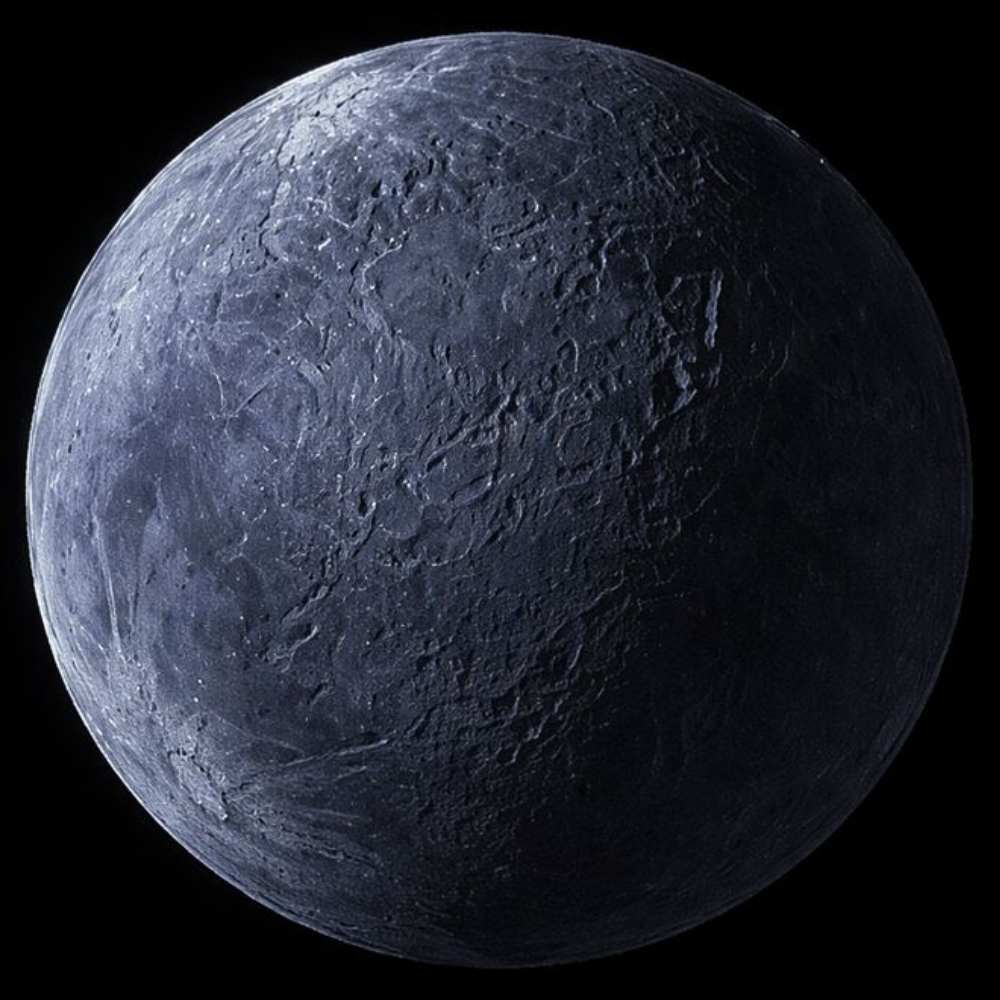 Orcus, a large trans-Neptunian object in the Kuiper Belt, showing an icy, dark surface and spherical shape characteristic of dwarf planet candidates.