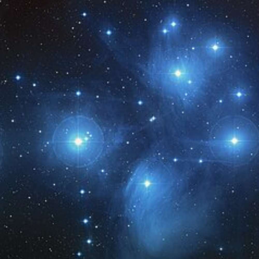 High-resolution image of the Pleiades star cluster (M45), showing the blue reflection nebula and bright young stars known as the Seven Sisters.