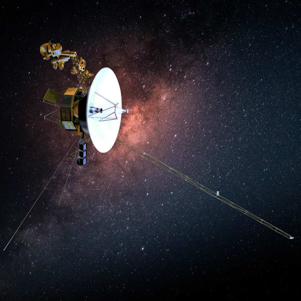 Artist’s illustration of Voyager 2 spacecraft traveling through deep space, featuring its high-gain antenna and extended instrument boom as it continues its interstellar mission beyond the heliosphere.